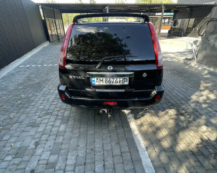Черный Ниссан ИксТрейл, объемом двигателя 2 л и пробегом 215 тыс. км за 7000 $, фото 13 на Automoto.ua