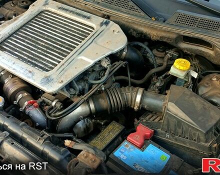 Черный Ниссан ИксТрейл, объемом двигателя 2.2 л и пробегом 294 тыс. км за 5000 $, фото 3 на Automoto.ua