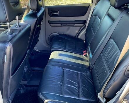 Черный Ниссан ИксТрейл, объемом двигателя 2.5 л и пробегом 245 тыс. км за 6500 $, фото 5 на Automoto.ua