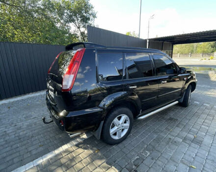 Черный Ниссан ИксТрейл, объемом двигателя 2 л и пробегом 215 тыс. км за 7000 $, фото 11 на Automoto.ua