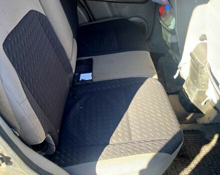 Черный Ниссан ИксТрейл, объемом двигателя 2.5 л и пробегом 365 тыс. км за 4500 $, фото 4 на Automoto.ua