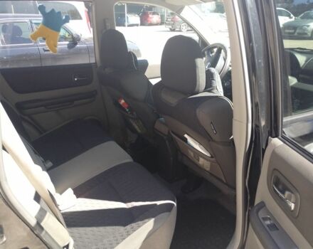 Черный Ниссан ИксТрейл, объемом двигателя 2 л и пробегом 270 тыс. км за 4000 $, фото 5 на Automoto.ua