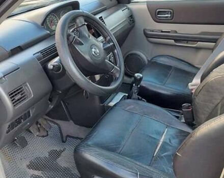 Чорний Ніссан ІксТрейл, об'ємом двигуна 2.18 л та пробігом 270 тис. км за 6300 $, фото 7 на Automoto.ua