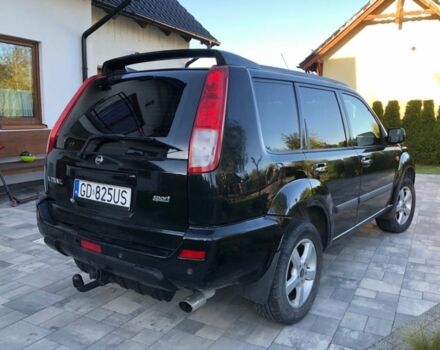 Черный Ниссан ИксТрейл, объемом двигателя 2.2 л и пробегом 266 тыс. км за 2200 $, фото 1 на Automoto.ua