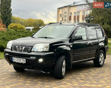 Чорний Ніссан ІксТрейл, об'ємом двигуна 2.5 л та пробігом 179 тис. км за 6800 $, фото 44 на Automoto.ua