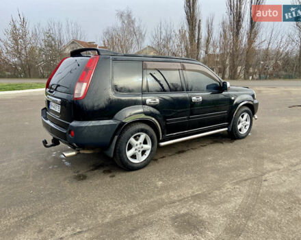 Черный Ниссан ИксТрейл, объемом двигателя 2.49 л и пробегом 300 тыс. км за 6200 $, фото 4 на Automoto.ua