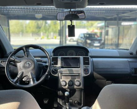 Черный Ниссан ИксТрейл, объемом двигателя 2 л и пробегом 215 тыс. км за 7000 $, фото 19 на Automoto.ua