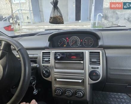 Черный Ниссан ИксТрейл, объемом двигателя 2.18 л и пробегом 308 тыс. км за 6500 $, фото 3 на Automoto.ua
