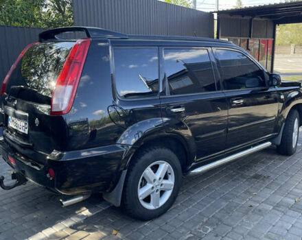 Черный Ниссан ИксТрейл, объемом двигателя 2 л и пробегом 215 тыс. км за 7000 $, фото 10 на Automoto.ua