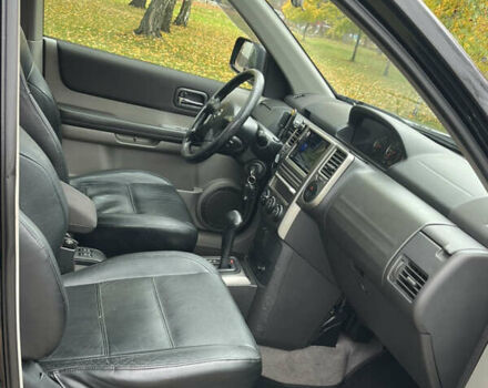 Чорний Ніссан ІксТрейл, об'ємом двигуна 2.5 л та пробігом 179 тис. км за 6800 $, фото 13 на Automoto.ua