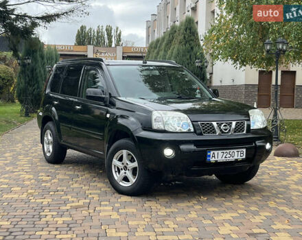 Чорний Ніссан ІксТрейл, об'ємом двигуна 2.5 л та пробігом 179 тис. км за 6800 $, фото 45 на Automoto.ua