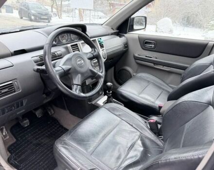 Черный Ниссан ИксТрейл, объемом двигателя 2.2 л и пробегом 217 тыс. км за 2974 $, фото 2 на Automoto.ua