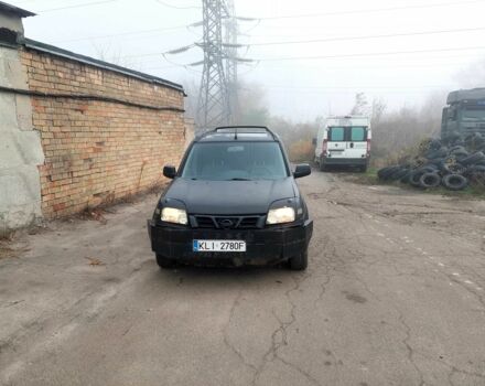 Черный Ниссан ИксТрейл, объемом двигателя 2.2 л и пробегом 250 тыс. км за 2750 $, фото 3 на Automoto.ua