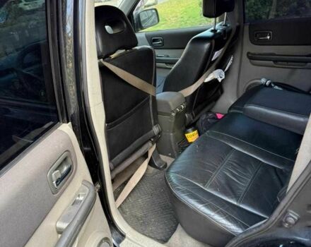 Чорний Ніссан ІксТрейл, об'ємом двигуна 2.2 л та пробігом 360 тис. км за 4500 $, фото 4 на Automoto.ua