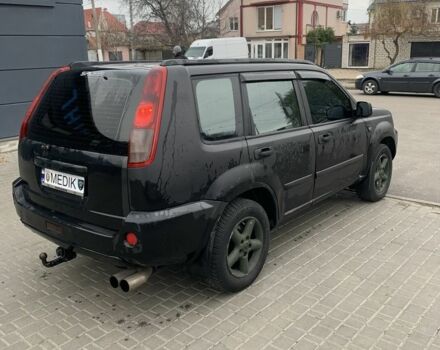 Чорний Ніссан ІксТрейл, об'ємом двигуна 2.2 л та пробігом 390 тис. км за 3561 $, фото 4 на Automoto.ua