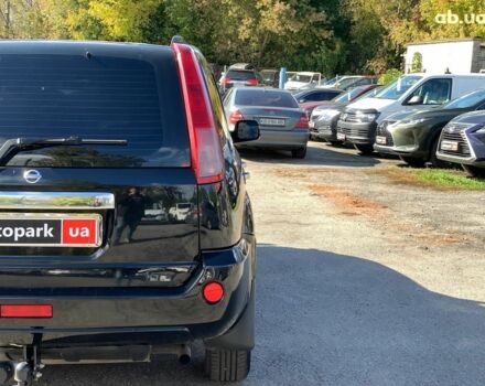 Черный Ниссан ИксТрейл, объемом двигателя 2.5 л и пробегом 295 тыс. км за 6890 $, фото 10 на Automoto.ua