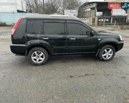 Черный Ниссан ИксТрейл, объемом двигателя 2.5 л и пробегом 285 тыс. км за 6500 $, фото 6 на Automoto.ua