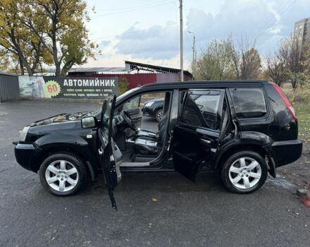 Черный Ниссан ИксТрейл, объемом двигателя 2.2 л и пробегом 306 тыс. км за 3800 $, фото 1 на Automoto.ua