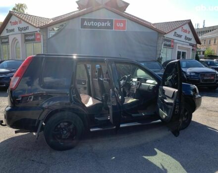 Черный Ниссан ИксТрейл, объемом двигателя 2.5 л и пробегом 295 тыс. км за 6890 $, фото 12 на Automoto.ua