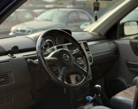 Черный Ниссан ИксТрейл, объемом двигателя 2.2 л и пробегом 360 тыс. км за 7200 $, фото 7 на Automoto.ua