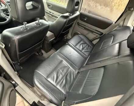 Черный Ниссан ИксТрейл, объемом двигателя 2.2 л и пробегом 249 тыс. км за 2600 $, фото 6 на Automoto.ua