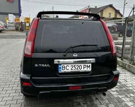 Черный Ниссан ИксТрейл, объемом двигателя 2.5 л и пробегом 282 тыс. км за 6250 $, фото 4 на Automoto.ua