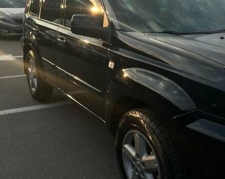 Черный Ниссан ИксТрейл, объемом двигателя 2.5 л и пробегом 261 тыс. км за 8300 $, фото 5 на Automoto.ua