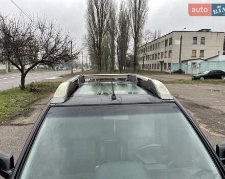 Черный Ниссан ИксТрейл, объемом двигателя 2.5 л и пробегом 285 тыс. км за 6500 $, фото 8 на Automoto.ua