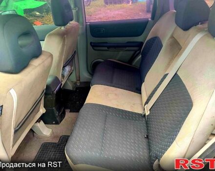 Черный Ниссан ИксТрейл, объемом двигателя 2.2 л и пробегом 248 тыс. км за 3800 $, фото 9 на Automoto.ua