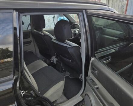 Черный Ниссан ИксТрейл, объемом двигателя 2.2 л и пробегом 220 тыс. км за 2250 $, фото 9 на Automoto.ua