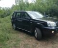 Черный Ниссан ИксТрейл, объемом двигателя 2.2 л и пробегом 320 тыс. км за 4429 $, фото 1 на Automoto.ua