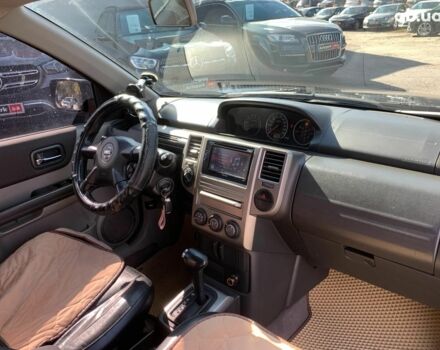 Черный Ниссан ИксТрейл, объемом двигателя 2.5 л и пробегом 295 тыс. км за 6890 $, фото 24 на Automoto.ua