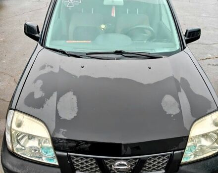 Черный Ниссан ИксТрейл, объемом двигателя 2.2 л и пробегом 100 тыс. км за 5500 $, фото 4 на Automoto.ua