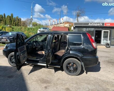 Черный Ниссан ИксТрейл, объемом двигателя 2.5 л и пробегом 295 тыс. км за 6890 $, фото 14 на Automoto.ua