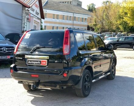 Черный Ниссан ИксТрейл, объемом двигателя 2.5 л и пробегом 295 тыс. км за 6890 $, фото 4 на Automoto.ua