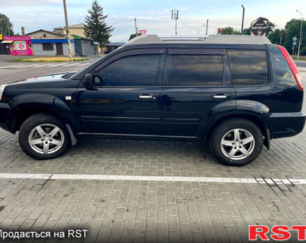 Черный Ниссан ИксТрейл, объемом двигателя 2.5 л и пробегом 280 тыс. км за 7099 $, фото 1 на Automoto.ua