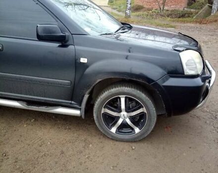 Черный Ниссан ИксТрейл, объемом двигателя 2.5 л и пробегом 202 тыс. км за 6700 $, фото 3 на Automoto.ua