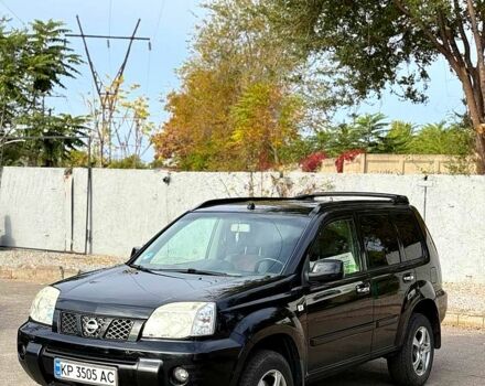 Черный Ниссан ИксТрейл, объемом двигателя 2.2 л и пробегом 360 тыс. км за 7300 $, фото 3 на Automoto.ua