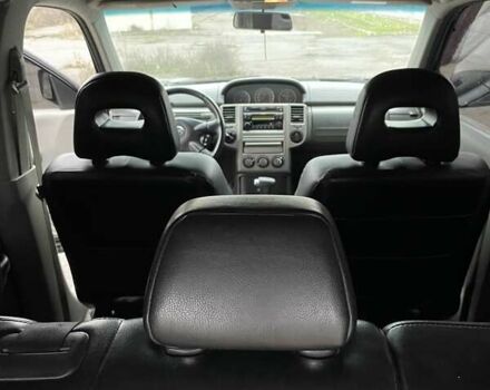 Черный Ниссан ИксТрейл, объемом двигателя 2.5 л и пробегом 285 тыс. км за 6500 $, фото 17 на Automoto.ua