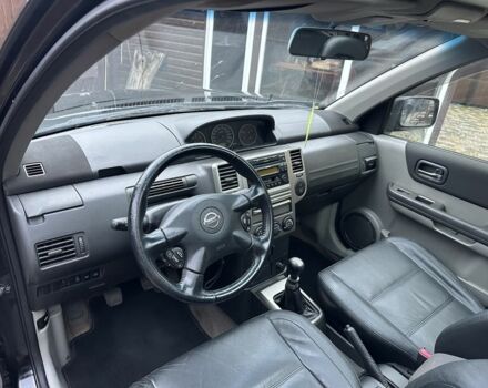 Черный Ниссан ИксТрейл, объемом двигателя 2.2 л и пробегом 168 тыс. км за 6699 $, фото 20 на Automoto.ua