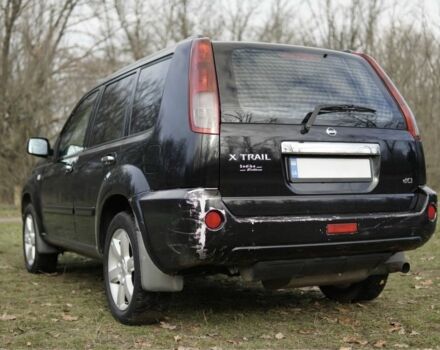 Черный Ниссан ИксТрейл, объемом двигателя 2.2 л и пробегом 273 тыс. км за 4267 $, фото 2 на Automoto.ua