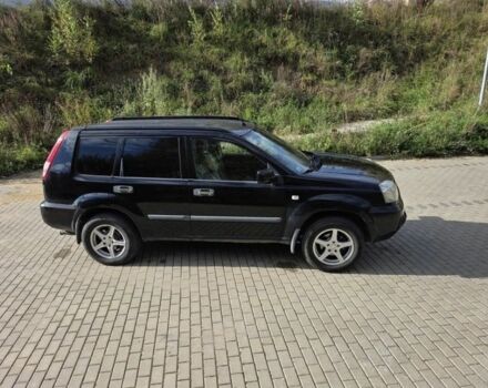 Черный Ниссан ИксТрейл, объемом двигателя 2.2 л и пробегом 220 тыс. км за 2250 $, фото 3 на Automoto.ua