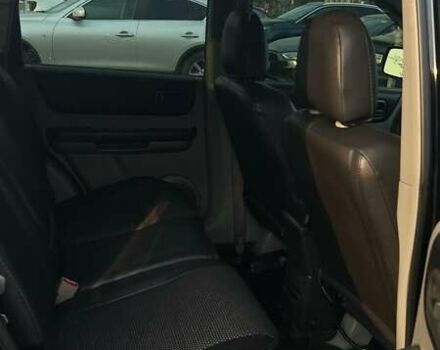 Черный Ниссан ИксТрейл, объемом двигателя 2.5 л и пробегом 261 тыс. км за 8300 $, фото 12 на Automoto.ua