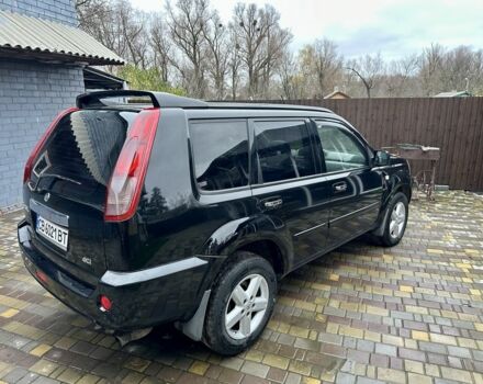 Черный Ниссан ИксТрейл, объемом двигателя 2.2 л и пробегом 168 тыс. км за 6699 $, фото 2 на Automoto.ua