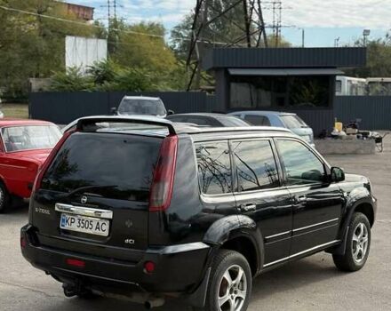 Черный Ниссан ИксТрейл, объемом двигателя 2.2 л и пробегом 360 тыс. км за 7200 $, фото 1 на Automoto.ua