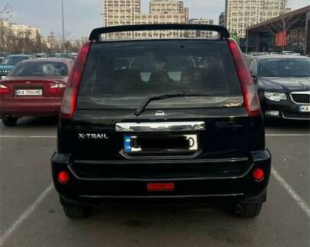 Черный Ниссан ИксТрейл, объемом двигателя 2.5 л и пробегом 261 тыс. км за 8300 $, фото 16 на Automoto.ua