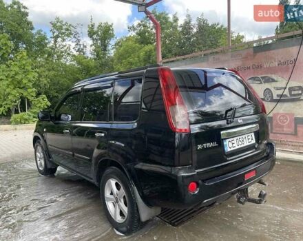 Черный Ниссан ИксТрейл, объемом двигателя 2.2 л и пробегом 300 тыс. км за 7000 $, фото 1 на Automoto.ua