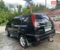 Черный Ниссан ИксТрейл, объемом двигателя 2.2 л и пробегом 300 тыс. км за 7000 $, фото 1 на Automoto.ua