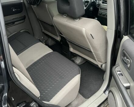 Черный Ниссан ИксТрейл, объемом двигателя 2.2 л и пробегом 206 тыс. км за 4200 $, фото 10 на Automoto.ua