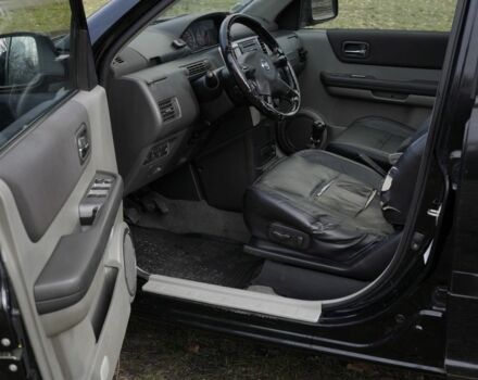 Черный Ниссан ИксТрейл, объемом двигателя 2.2 л и пробегом 273 тыс. км за 4267 $, фото 10 на Automoto.ua